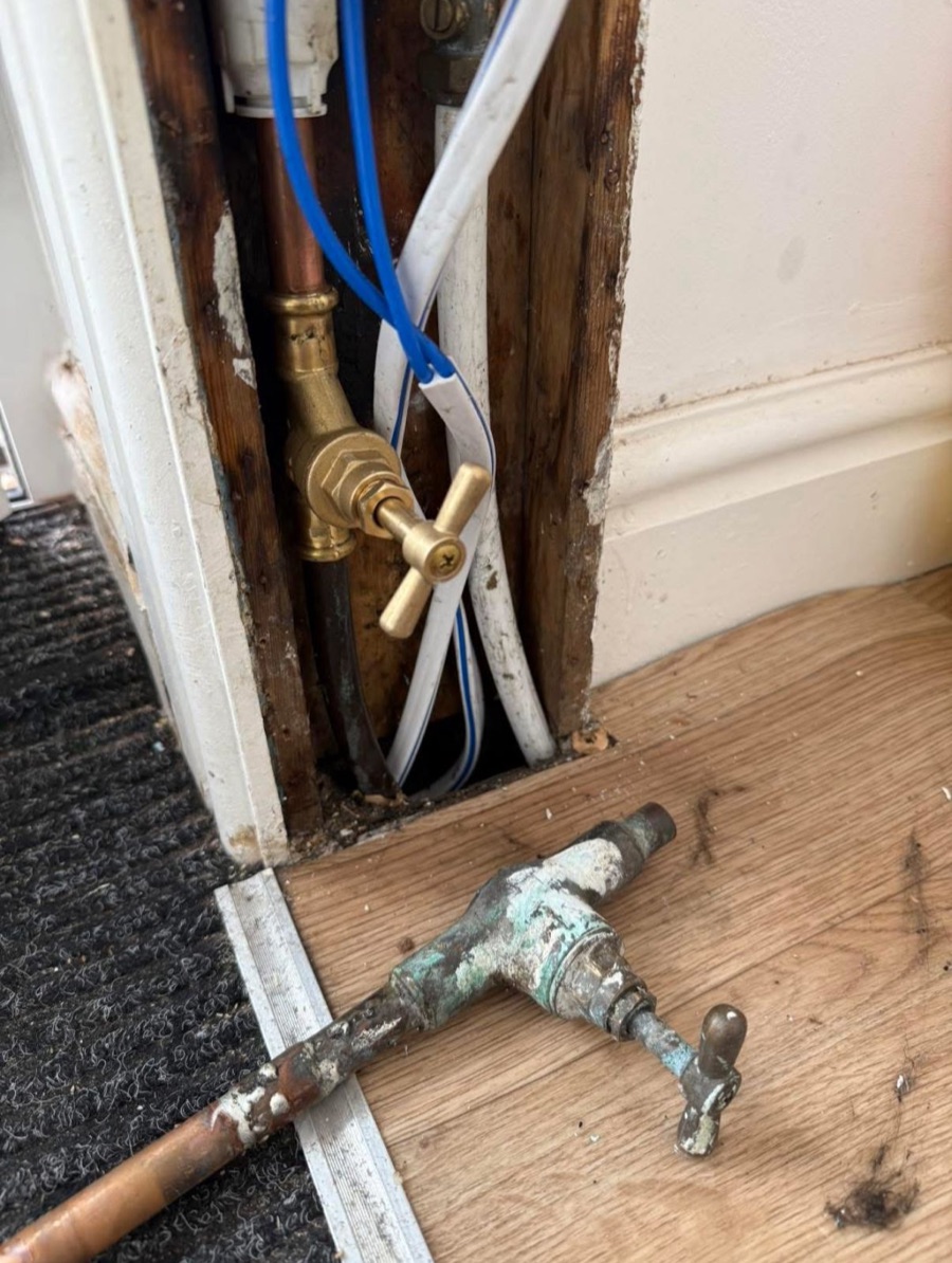 An old corroded stopcock replaced with a new isolation valve by LR Heating, Leeds