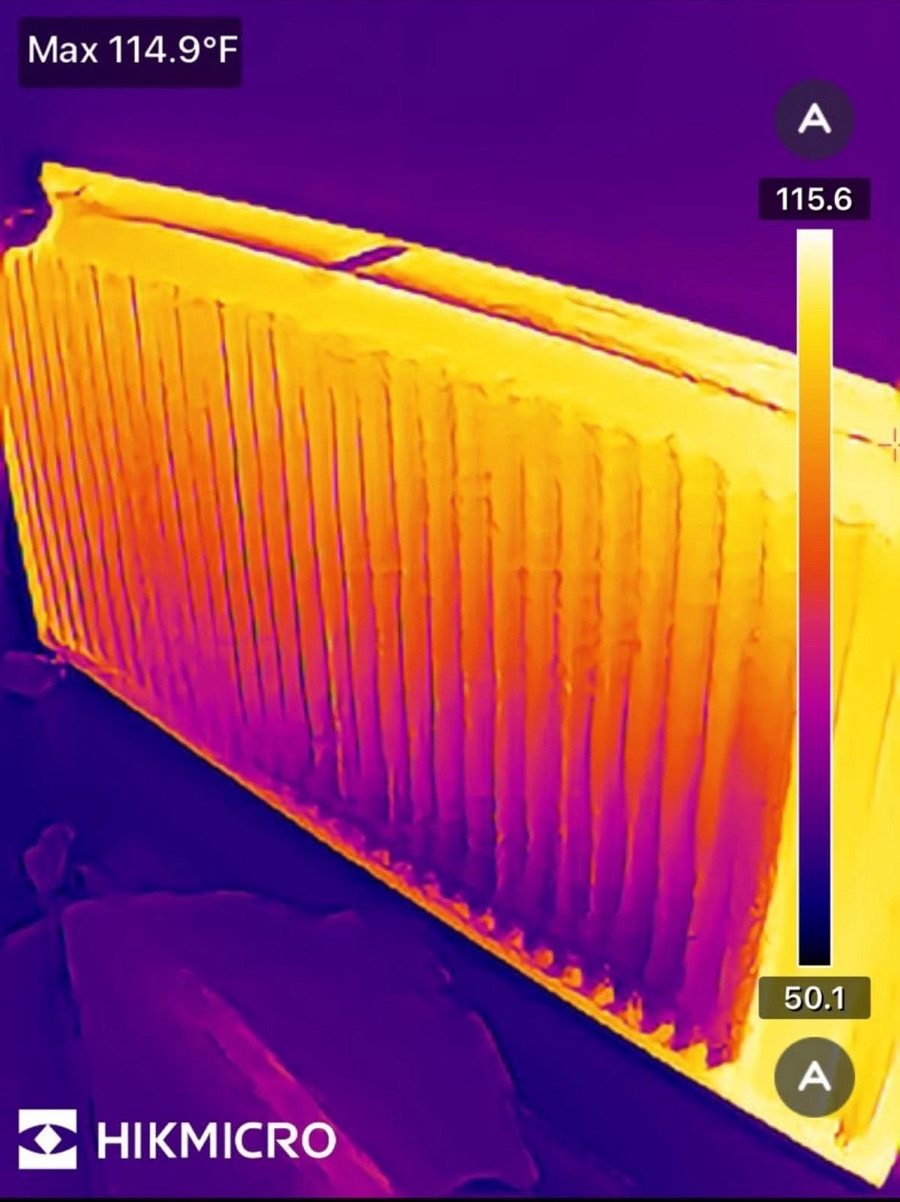 Thermal-imaging check showing a radiator heating evenly during an LR Heating service in Leeds