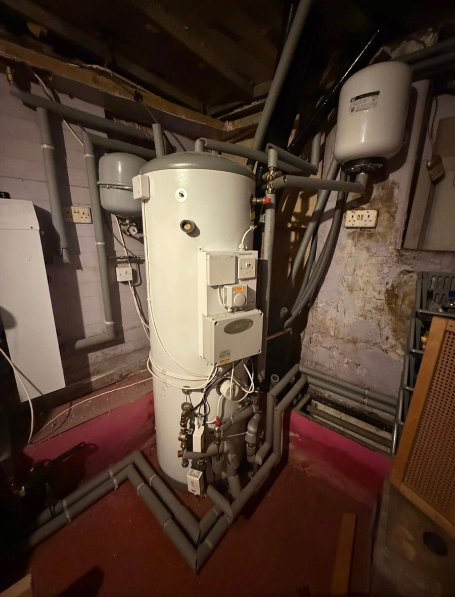 Unvented hot-water cylinder with expansion vessels and pipework installed by LR Heating, Leeds