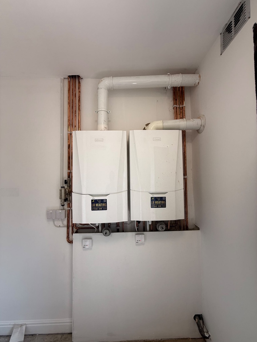 Two new Ideal combi boilers installed side by side for a flats conversion by LR Heating